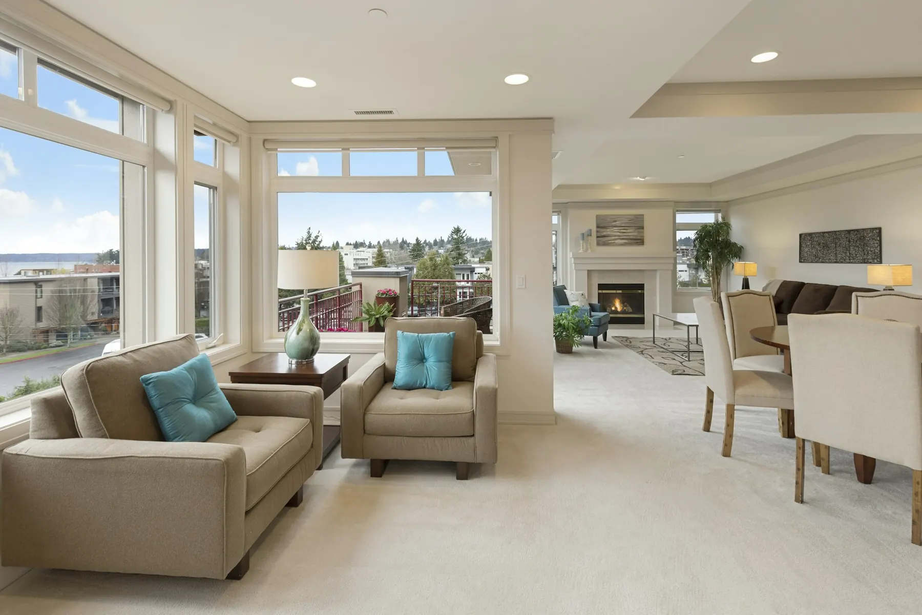 Dining area beside a sunlit living room