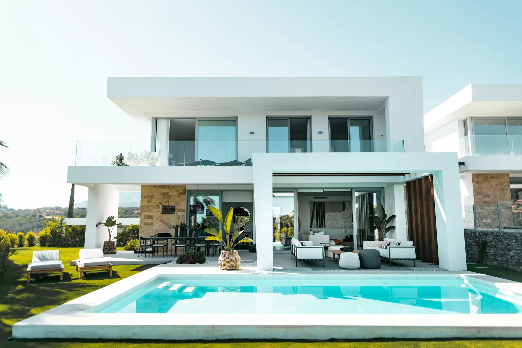 White modern villa with terraces and swimming pool