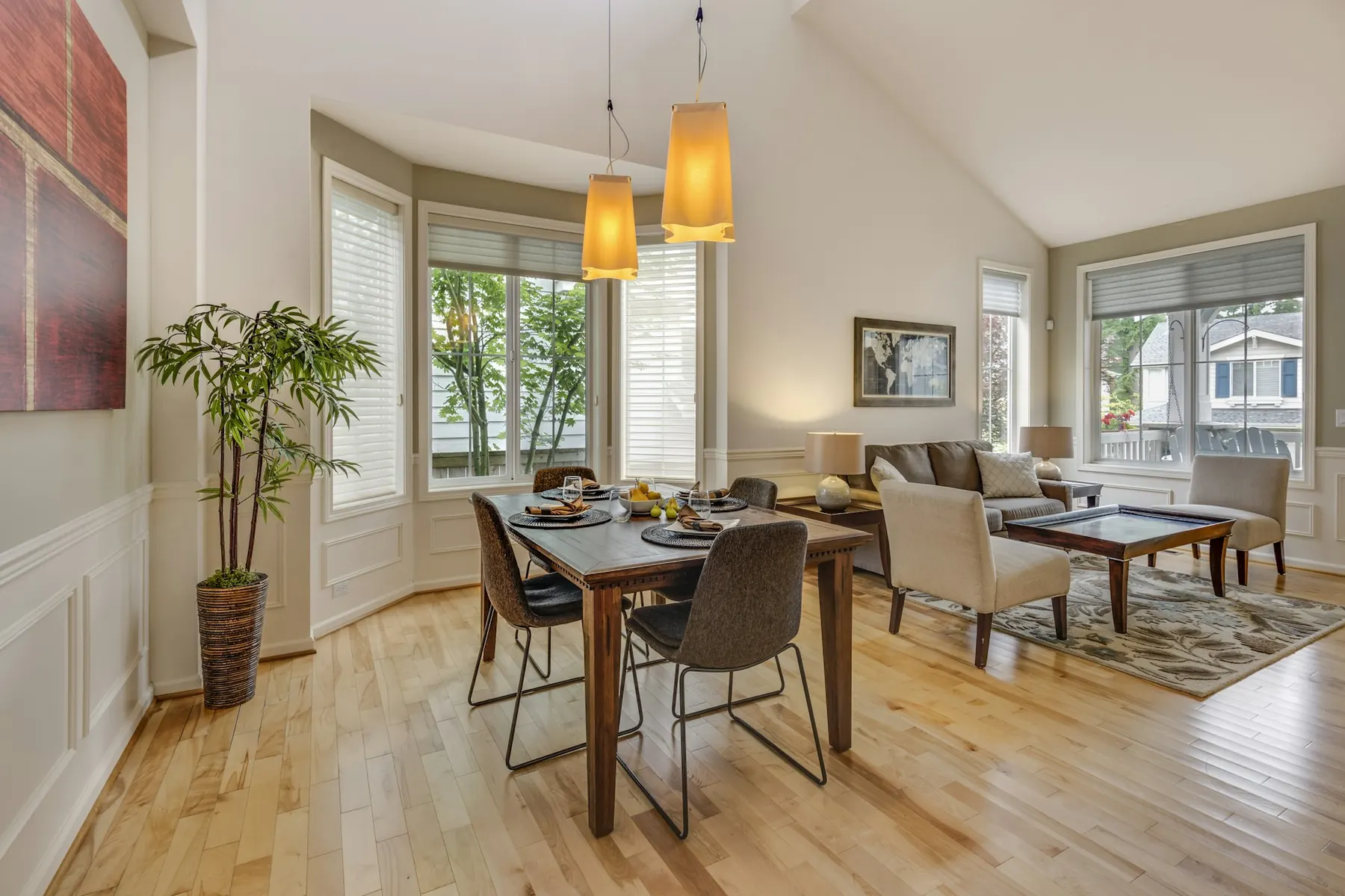 Dining table in a bright open-plan room
